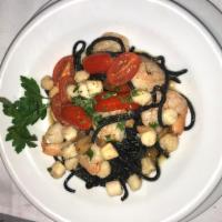 Black Taglierini · Homemade Squid Ink Linguine with Shrimp, Scallops, Cherry Tomatos, Garlic and Olive Oil