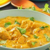 Chicken Mango · A very delicate combination of boneless cubes of curried chicken and chef’s special mango sa...