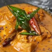Chicken Mangalorean · Cubes of boneless chicken breast with green chilies, ginger and fresh curry leaves (specialt...