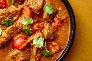 Lamb Rogan Josh · Marinated boneless cubes of lamb cooked on slow fire with ungrounded whole spices.