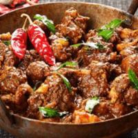 Lamb Bhana · Lamb cooked in a thick shallot and tomato sauce.