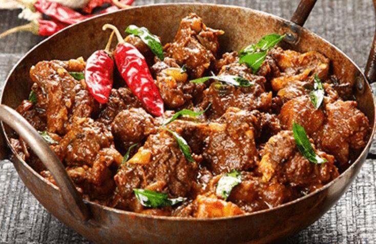 Lamb Bhana · Lamb cooked in a thick shallot and tomato sauce.