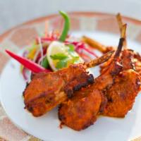 Adrak Lamb Chops · Ginger. Imported lamb chops marinated in red wine, yogurt, ginger and spices cooked on skewe...