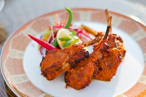 Adrak Lamb Chops · Ginger. Imported lamb chops marinated in red wine, yogurt, ginger and spices cooked on skewers in tandoor.
