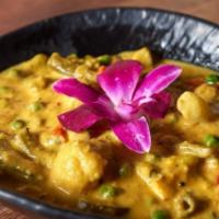 Vegetable Korma · Handpicked vegetable cooked with cashew nut sauce.