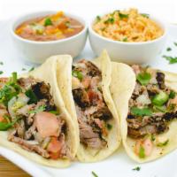 3 Piece Tacos · Served in soft corn tortillas with choice of beef, chicken, or fish, pico de gallo and avoca...