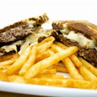 Rafi's Patty Melt · Served on rye bread with a hand pressed, 1/2 lb. Angus beef patty loaded with Swiss cheese, ...