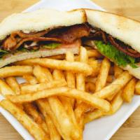 Rafi's BLT Sandwich · Served on choice of rye, white, or wheat bread with crispy bacon, lettuce, tomato and mayo. ...
