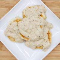 Biscuits & Gravy · 2 country biscuits smothered in country gravy.