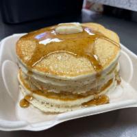 Short Stack Pancakes · 2 buttermilk pancakes served with syrup and butter. Add meat for an additional charge.