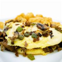 Philly Omelette · Grilled steak, mushrooms, onions, 2 eggs and Swiss cheese. Served with crispy tater tots