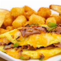 Denver Omelette · Juicy ham, 2 eggs, grilled onions and peppers and mixed cheese. Served with crispy tater tots