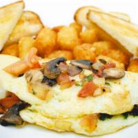 Egg White Omelette · Egg whites, mushroom, tomato, spinach and Swiss cheese.Served with crispy tater tots