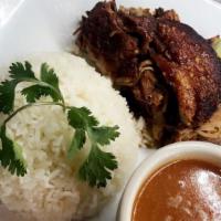 Pernil ( Roasted Pork) · Pernil (Roasted Pork) served with rice and beans or moro