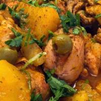 Stew Chicken (Pollo Guisado) · Stew chicken, rice and beans or moro and a green salad