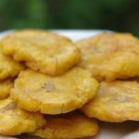 Tostones / Fried Green Plantains · Fried green plantains.