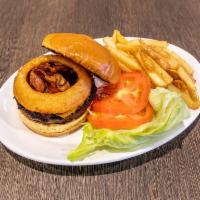 BBQ Burger · Angus patty, BBQ sauce, bacon, cheddar cheese and onion rings.