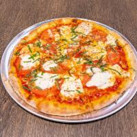 Margherita Pizza · Fresh mozzarella, tomato and basil.