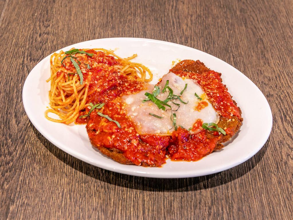 Eggplant Parmesan · breaded crispy eggplant topped with tomato sauce and mozzarella with a side of pasta.