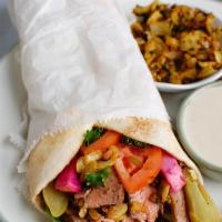 Pita Wrap · A rolled filled tortilla or flatbread. 