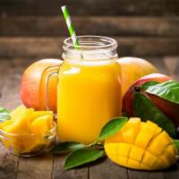 Caribbean Smoothie · Mango, Coconut, Banana, & your choice of Fresh Juice