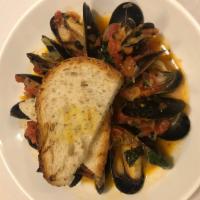 Prince Edward Island Mussels “Mariniere” · White Wine, Tomato, Basil, Garlic Croutons