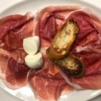 Prosciutto and Imported Buffalo Mozzarella · Aged 20 Months Prosciutto di Parma
