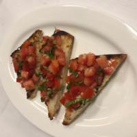 Bruschetta · Grilled Italian Pane di Casa, Tomatoes, Olive Oil, Garlic, Basil