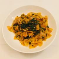 Farfalle con Tonno · Bow-tie Pasta, Sicilian Tuna, Broccoli Rabe, Light tomato Sauce, Chili