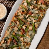 Chicken, Spinach, & Bacon Flatbread · Tender chicken, creamy spinach, green onions, mozzarella
