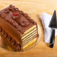 4. Seven Layer Cake · 7 layers of vanilla cake filled with bittersweet chocolate pudding and iced with chocolate f...