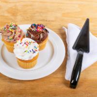 19. Vanilla Cupcake with Vanilla Buttercream Icing · With seasonal sprinkles.
