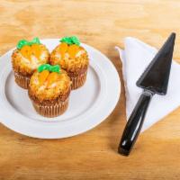 25. Carrot Cupcake · Our delicious cake made with carrots, walnuts, and pineapple with cream cheese icing.