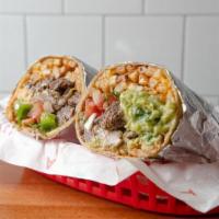 CARNE ASADA BURRITO · Fire grilled premium marinated steak. Choose CALIFORNIA BURRITO with French fries inside or ...