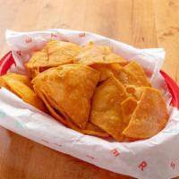 HOMEMADE TORTILLA CHIPS · Homemade corn tortilla chips. Vegan.