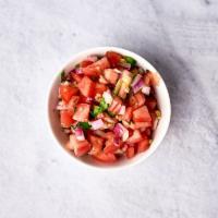 Pico de Gallo Dip · Finely chopped plum tomatoes and red onions tossed in S+P, lime and cilantro.