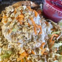 Ninja Star Salad · Chinese chicken, carrots, granola, sunflower seeds and raspberry vinaigrette served on a bed...