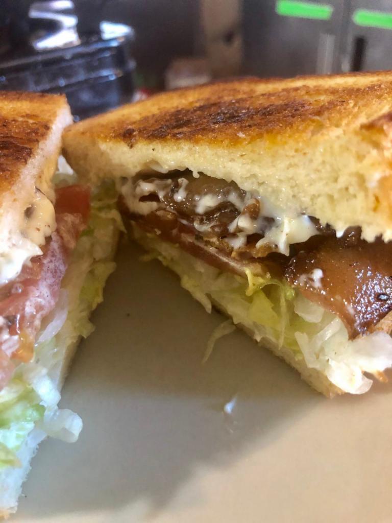 BLTremendous Sandwich · Chopped bacon, lettuce, tomato, avocado and fancy sauce. On sourdough bread Served with skillet potatoes & marinated veggies. 