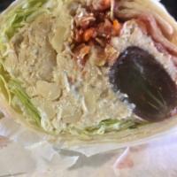 Ninja Bomb Wrap · A wrap filled with Chinese chicken, lettuce, shredded carrots, granola, sunflower seeds and ...