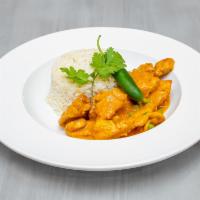 Chicken Curry · Pollo al curry.