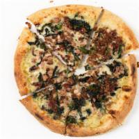 11. Alfredo Pizza · White sauce, cheddar, broccoli rabe, bacon, ham. (This Pizza can not be made gluten free.)