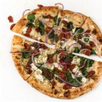 13. Mediterranean Pizza · Olive oil, garlic, feta, spinach, semi-dried tomato, tapenade, red onion, oregano.
