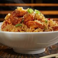Chicken 65 Fried Rice · Spicy chicken, curry leaves, Indian spice, dry red chili.