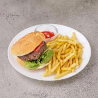 Hamburger Deluxe · 1/2 lb. fresh chopped beef, lettuce, tomato and french fries.
