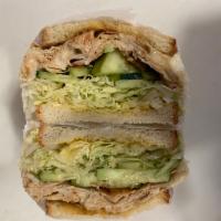 (S20) The Smoker · Smoked turkey, cucumber, lettuce, melted provolone and honey mustard.