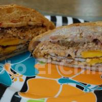 RIKITAKI · Special Dominican Sandwich Whitt eggs sprinkles grown beef Dominican frying Cheese. Ingredie...