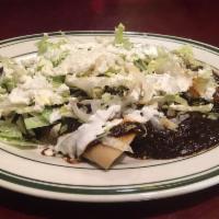 Enchiladas de Mole · Chicken or cheese with mole sauce. Served with rice, beans and tortillas. 