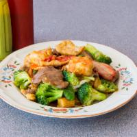 Happy Family  · Jumbo shrimp, chicken, beef and lobster with mixed vegetables in special sauce. Add protein ...