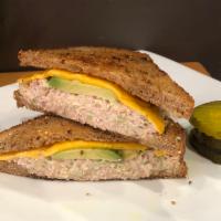 California Tuna Melt · Tuna salad with celery & mayo, American cheese & avocado on toasted 7-grain bread.