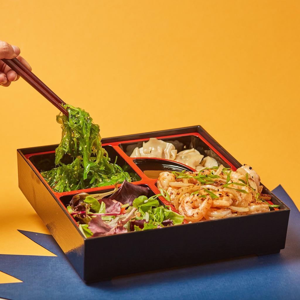 Shrimp Bento Combo · Shrimp teriyaki, 3 pieces of dumplings, your choice of salad, mixed green, and rice